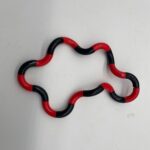 Black and red custom twist fidget snake variant