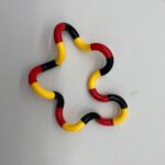 Black yellow and red custom twist fidget snake variant