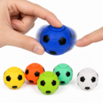 Hand using a mini spherical soccer ball fidget spinner