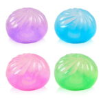 Assorted purple blue pink and green glitter dumpling squishy toys