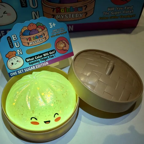 Glow in the dark dumpling squishy toy in steamer container for wholesale sourcing