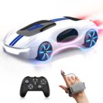 White gesture-control RC stunt car with handheld remote and wrist controller