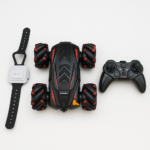Gesture-control RC stunt car with wearable controller and handheld remote