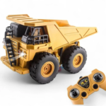 RC construction dump truck with raised cargo bed and handheld remote controller