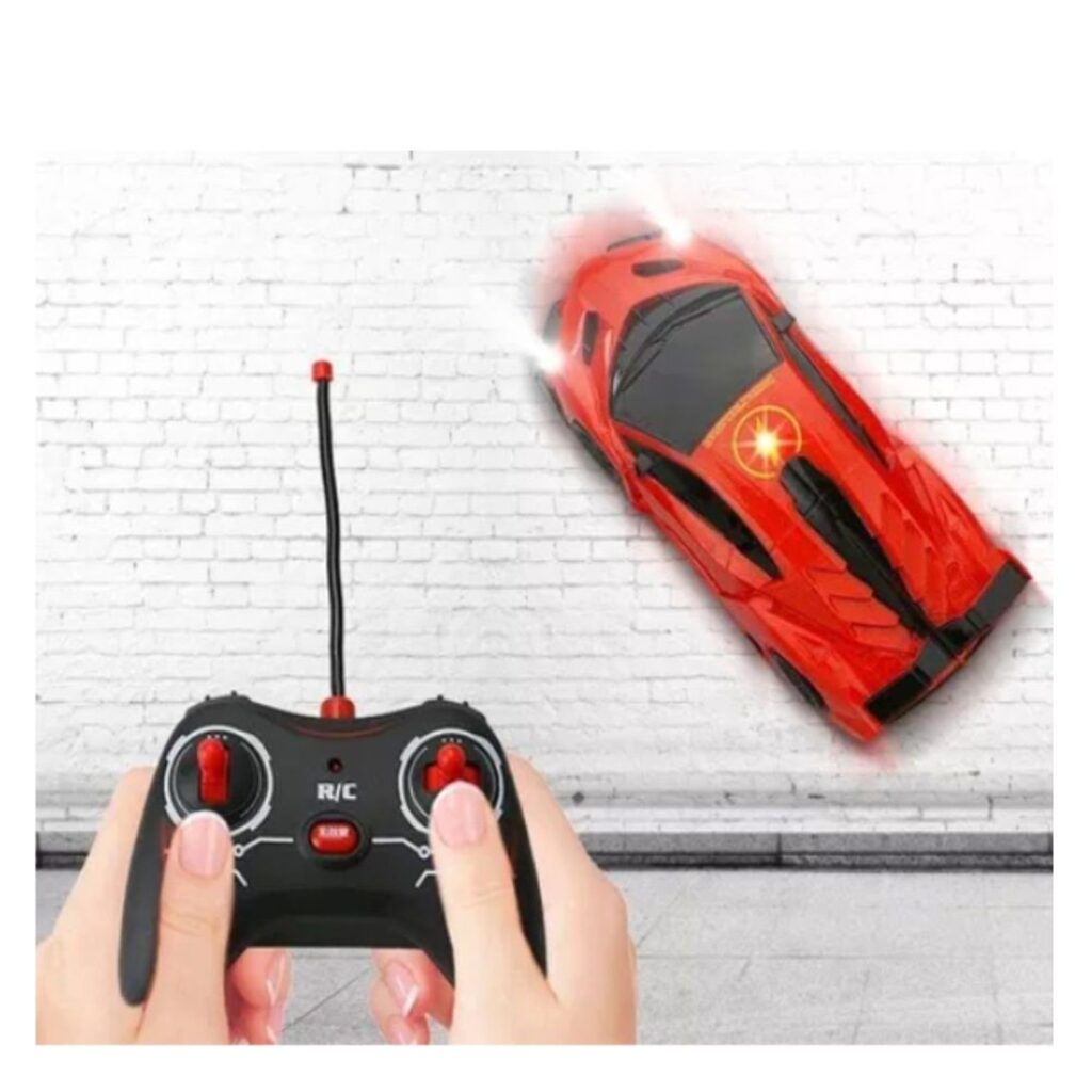 Wall-climbing remote control car driving on a smooth wall with handheld controller